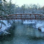 Bridge over icy river in Chippewa Valley, WI